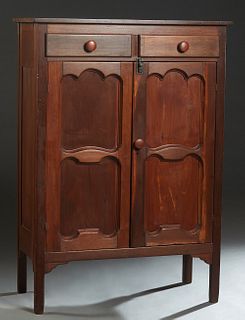 Louisiana Carved Jelly Cupboard, 19th c., the rectangular top over two frieze drawers above double cupboard doors, on block legs, H.- 54 1/2 in., W.- 