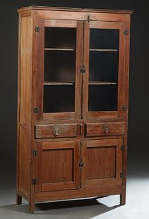 Louisiana Carved Cypress Pie Safe, c. 1900, the stepped edge crown over double doors, one glazed, above two center frieze drawers over double cupboard
