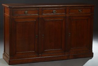 French Provincial Carved Cherry Louis XVI Style Sideboard, 20th c., the stepped rectangular top over two frieze drawers and double cupboard door, sepa