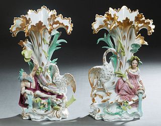 Pair of Old Paris Style Figural Flare Vases, 20th c., with gilt and polychromed relief figures and cranes, H.- 16/1/8 in., W.- 9 in., D.- 6 1/2 in.