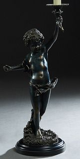 Patinated Bronze Standing Putto Lamp, 20th c., by Decorative Crafts Inc., upholding the light in his left hand, on a stepped circular composition base