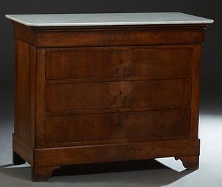 French Carved Cherry Marble Top Commode, 19th c., the rounded edge and corner white marble over a cavetto frieze drawer, and three setback deep drawer