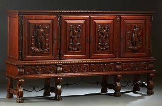 French Renaissance Style Carved Cherry Sideboard, 20th c., the stepped rounded edge crown over four figural carved cupboard doors, flanked by scroll c