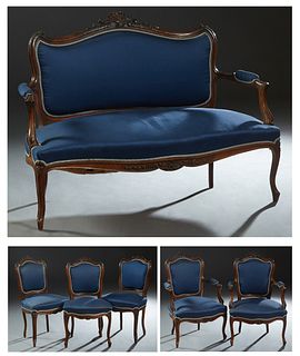 French Louis XV Style Carved Walnut Six Piece Parlor Suite, early 20th c., consisting of a settee, two fauteuils and three side chairs, the shell and 