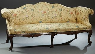 American Carved Mahogany Chippendale Style Settee, 19th c., the cushioned serpentine back over rolled arms, to a cushioned seat on scrolled trifid leg
