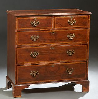 English Georgian Inlaid Walnut Chest, early 19th c., the stepped top over two frieze drawers and three deep drawers, on a plinth base on bracket feet,