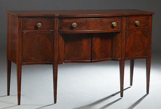 Hepplewhite Style Inlaid Mahogany Bowfront Sideboard, early 20th c., with a central frieze drawer over double serpentine cupboard doors, flanked by co