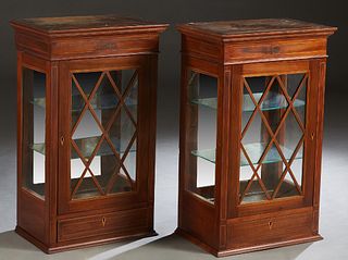 Pair of English Inlaid Mahogany Hanging Cabinets, early 20th c., the stepped crown over an X-form mullioned glazed door above a small bottom drawer, o