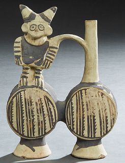 Chancay Painted Clay Double-Bodied Vessel, Early Post-Classic, 900-1200, Peru, of black-painted white clay, the figure wearing a double-horned headdre