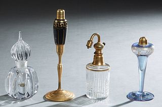 Group of Four Glass Perfume Bottles, 20th c., consisting of a Baccarat atomizer; a tall black glass and brass atomizer; a graceful pale blue gilt deco
