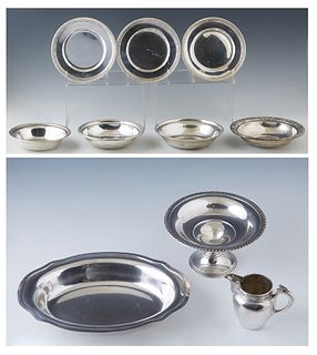 Group of Ten Pieces of Silver, consisting of an .800 creamer, #3134; a sterling compote with a gadrooned edge; 3 Gorham sterling bread plates, #180, w