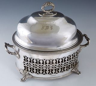 English Silverplated Warming Dish, 19th c., the domed lid over an interior dish above a hot water dish, and a lower alcohol burner, on a pierced sided