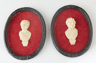Pair of Carved Ivory Profiles, 19th c., of satyrs, now mounted on red velvet backing, in oval relief decorated shadowbox frames, H.- 2 5/8 in., W.- 1 