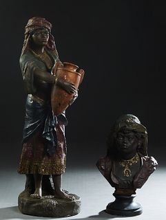 Two Polychromed Black Figures, early 20th c., one a chalkware bust of an Arab tribesman; the second a tall plaster figure of an Arab woman carrying an