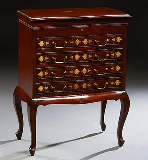 English Style Carved Mahogany Silver Chest, 20th c., the serpentine lifting lid over velvet lined storage, above four like inlaid drawers, on a plinth