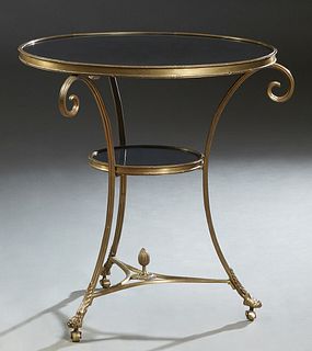 Contemporary Bronze Marble Top Side Table, 20th c., the circular bronze bound black marble on scrolled tripodal legs joined by a lower circular black 