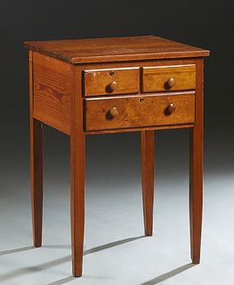Louisiana Carved Pine Side Table, c. 1910, the square top over two small drawers and a lower long drawer, on tapered square legs, H.- 30 1/4 in., W.- 