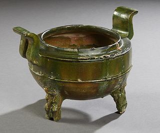 Chinese Green Glazed Tripodal Baluster Terracotta Pot, 19th c. or earlier, on tripodal figural carved legs, perhaps a funerary pot, H.- 6 3/4 in., W.-