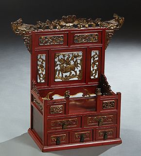Chinese Red Lacquered Altar, 20th c., with pierced gilt decorated figural and floral panels, above five small front drawers, H.- 28 in., W.- 19 in.,. 
