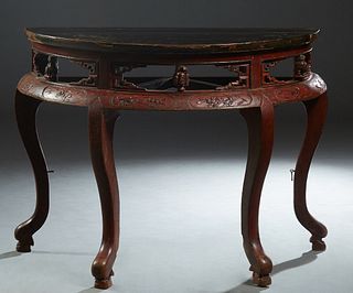 Pair of Chinese Red Lacquered Demilune Tables, Qing Dynasty, the demilune top over a pierced skirt above a relief carved edge panel, on cabriole legs 