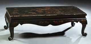 Chinese Black Lacquer Coffee Table, early 20th c., the top with floral and bird decoration, over a curved serpentine skirt, on cabriole legs, H.- 14 3
