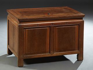 Chinese Carved Elm Coin Chest, late 19th c., Qing dynasty, the lifting top over paneled sides, on block feet, H.- 21 1/2 in., W.- 33 in., D.- 20 3/4 i