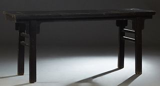 Chinese Black Lacquered Calligraphy Table, 17th c., Ming Dynasty, the rectangular top over a short skirt, on block legs, H.- 35 1/2 in., W.- 81 in., D