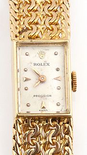 Vintage 18K Yellow Gold Lady's Precision Rolex Manual Wind Wristwatch, marked on watch face, case and bracelet, with a 17 Ruby movement, running, with