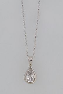 14K White Gold Pendant, with a pear shaped .59 ct. diamond within a conforming frame, on a tiny link white gold chain, L.- 17 3/4 in., with appraisal.