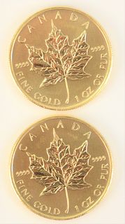 Two Canadian Maple Leafs, 2009, fine gold, 1 oz each.