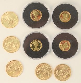 Five Gold Eagles, 1/4 oz. each, plus 4 Canadian 1/20 oz. gold.