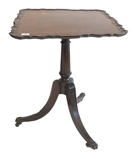 George II Mahogany Piecrust Tip Table, on turned shaft, on reeded downswept members, ending in brass paw feet, with 18th Century, height 28 inches, to