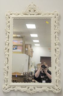 Chippendale Style Mirror, having white painted frame with carved scrolling vine and flowers, 50" x 30".