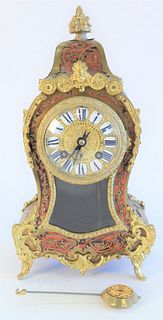 Louis XV Style Bouille Clock, with brass mounts, height 12 inches.