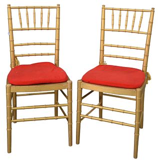 Set of Eight Faux Bamboo Chairs, gold with red slip seats, seat height 17 1/2 inches, total height 36.