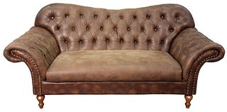 Contemporary Brown Leather Upholstered Sofa having rolled arms with tufted upholstered back and arms, length 74 inches.