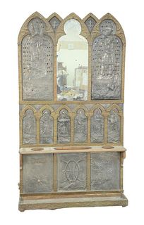 Gothic Hall Rack, having embossed brass and embossed pewter figures, King Arthur & Knights mounted with various colored glass beads and mirror center 