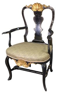 Queen Anne Armchair, with shell carved crest rail over vasiform back, over upholstered seat with shell carved front skirt, raised on cabriole legs wit
