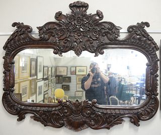 Large French Style Mirror with carved frame, height 47 inches. width 58 inches.