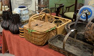 Large Lot of Baskets, on top and under a table.