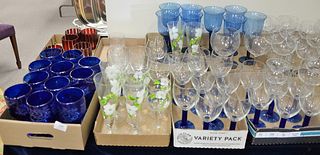 Eight Tray Lots of Glass Stemware, to include cranberry cut to clear goblets, cobalt blue etched glass stems, along with tall, blue glasses.