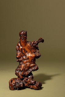 A Carved Natural Root Figure of an Immortal