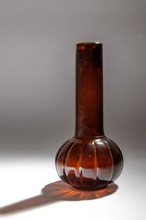 A Transparent Amber-Tone Glass Bottle
