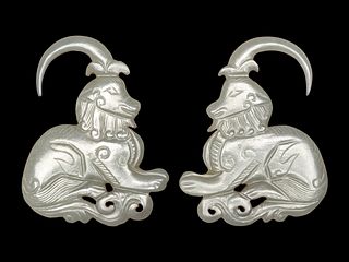 A Pair of Greyish Celadon Jade 'Ram' Earrings