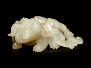 A White Jade Figure of a Mythical Beast