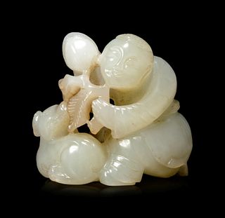 A Pale Celadon Jade Figural Group of Boy and Dog
