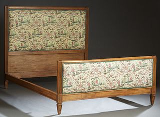 French Carved Beech Louis XVI Style Double Bed, 20th c., the upholstered cushioned headboard within reeded pilaster sides, to wooden rails and a like 