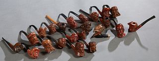 Collection of Twenty-Two Carved Wooden Face Pipes, early 20th c., consisting of 3 indians; 2 sailors; 2 vikings; 2 devils; Don Quixote; 2 Arabs; 2 Sol