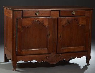 French Provincial Louis XV Style Carved Cherry Sideboard, 19th c., the canted corner rounded edge top over two frieze drawers above double cupboard do