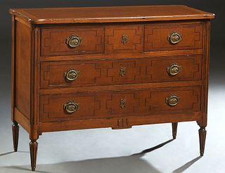 French Louis XVI Style Inlaid Carved Mahogany Commode, early 20th c., the ogee edge cookie corner top over two frieze drawers above two long drawers, 